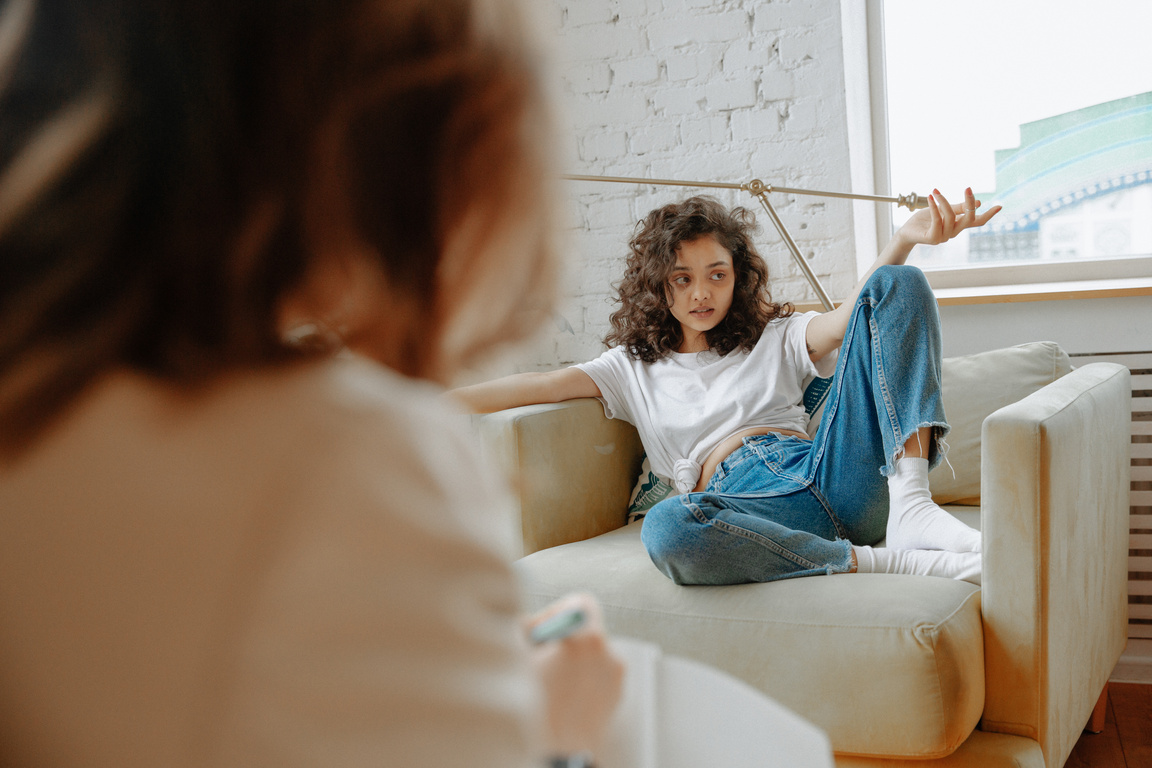 Young Woman Talking with Therapist