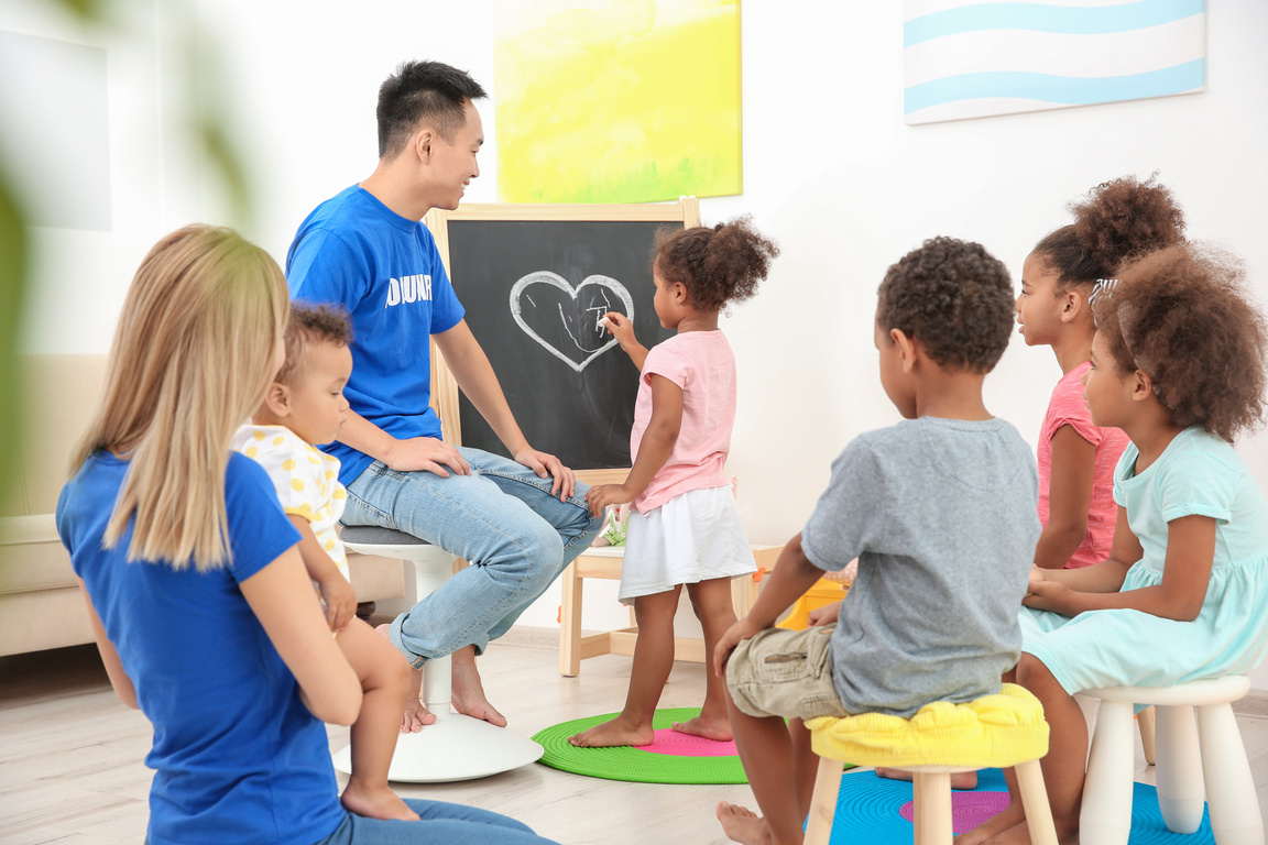 Volunteers Teaching Little Children